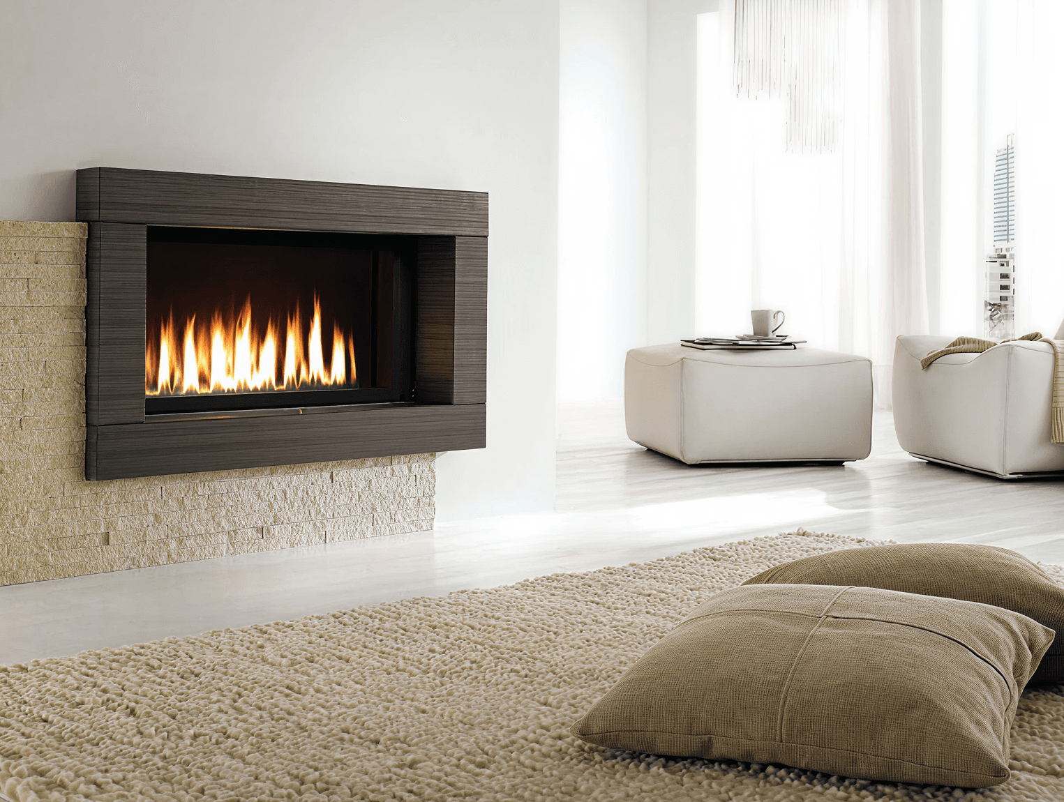 Modern living room with a cozy fireplace, beige textured rug, and soft pillows. Natural light flows through sheer curtains, creating a serene ambiance.