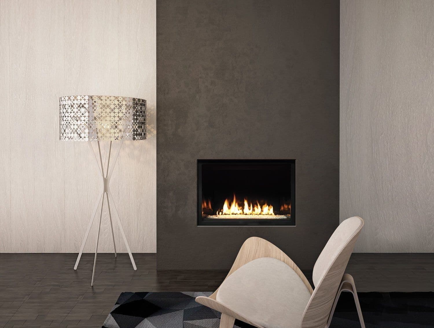 A sleek, modern living room with a gray wall hosts a lit fireplace. A stylish chair faces the flames. A patterned floor lamp stands to the left, exuding warmth and elegance.