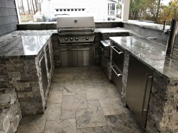 Bring the party outside with a beautiful outdoor kitchen built by Pemberton Appliance.