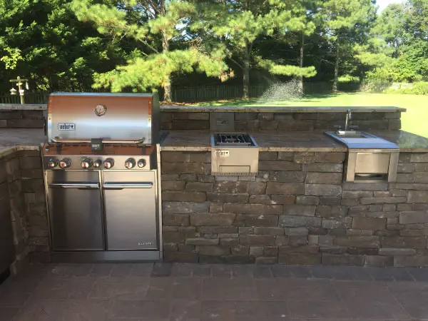 Bring the party outside with a beautiful outdoor kitchen built by Pemberton Appliance.