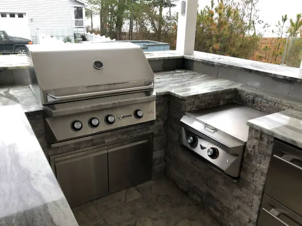 Bring the party outside with a beautiful outdoor kitchen built by Pemberton Appliance.